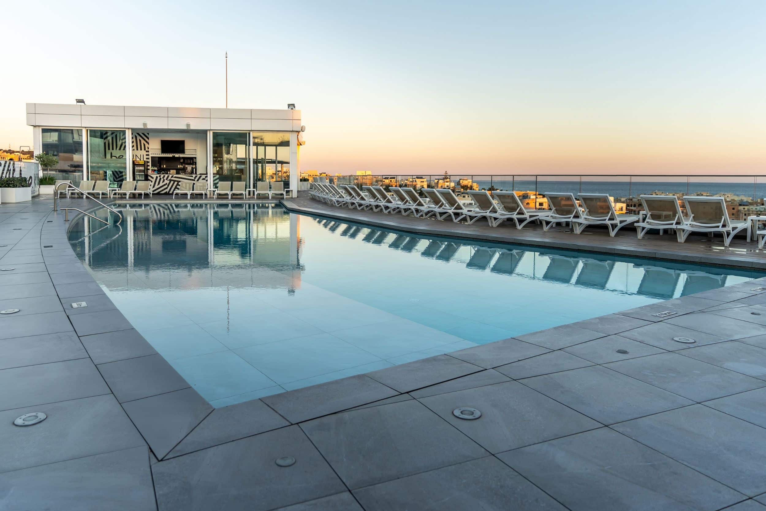 The exterior view and rooftop pool area at be.HOTEL St Julian's, the Best 4 Star Hotel in Malta, give an overview of the facilities the hotel offers its guests.