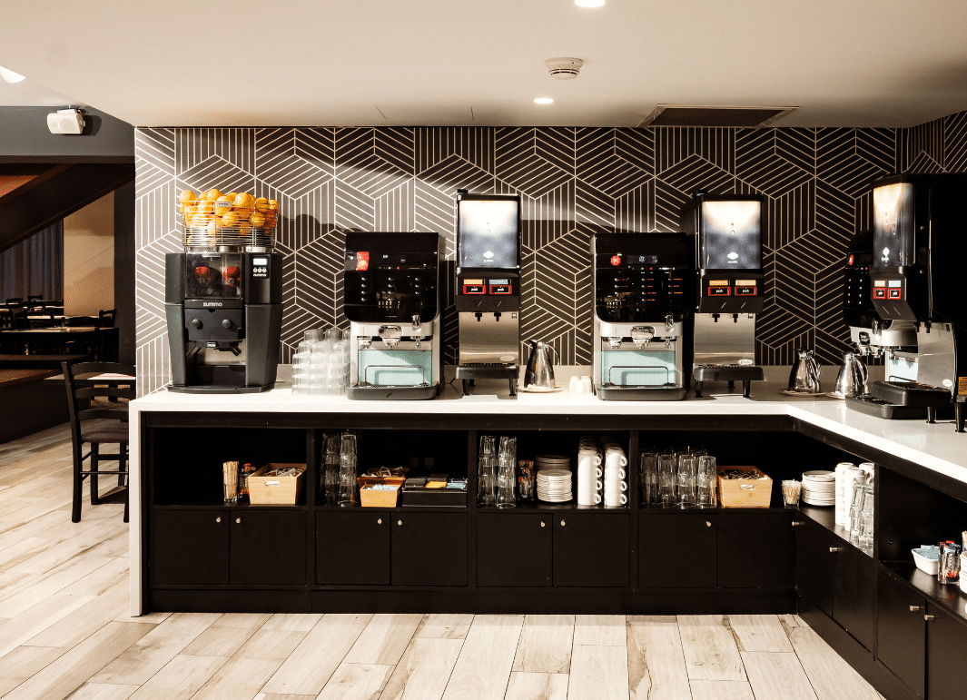 The bar and restaurant counter at the be.KINI rooftop pool of Be Hotel Malta.